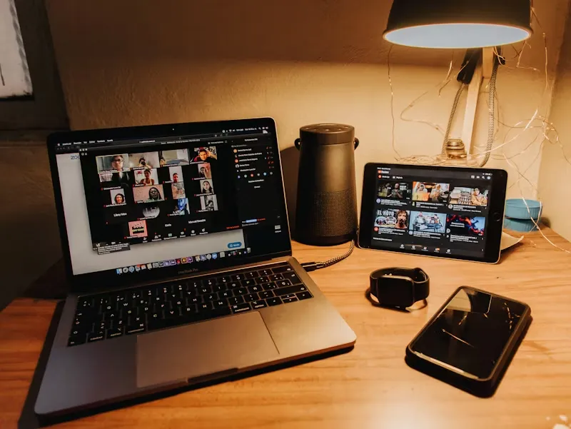 Person multitasking at a workspace